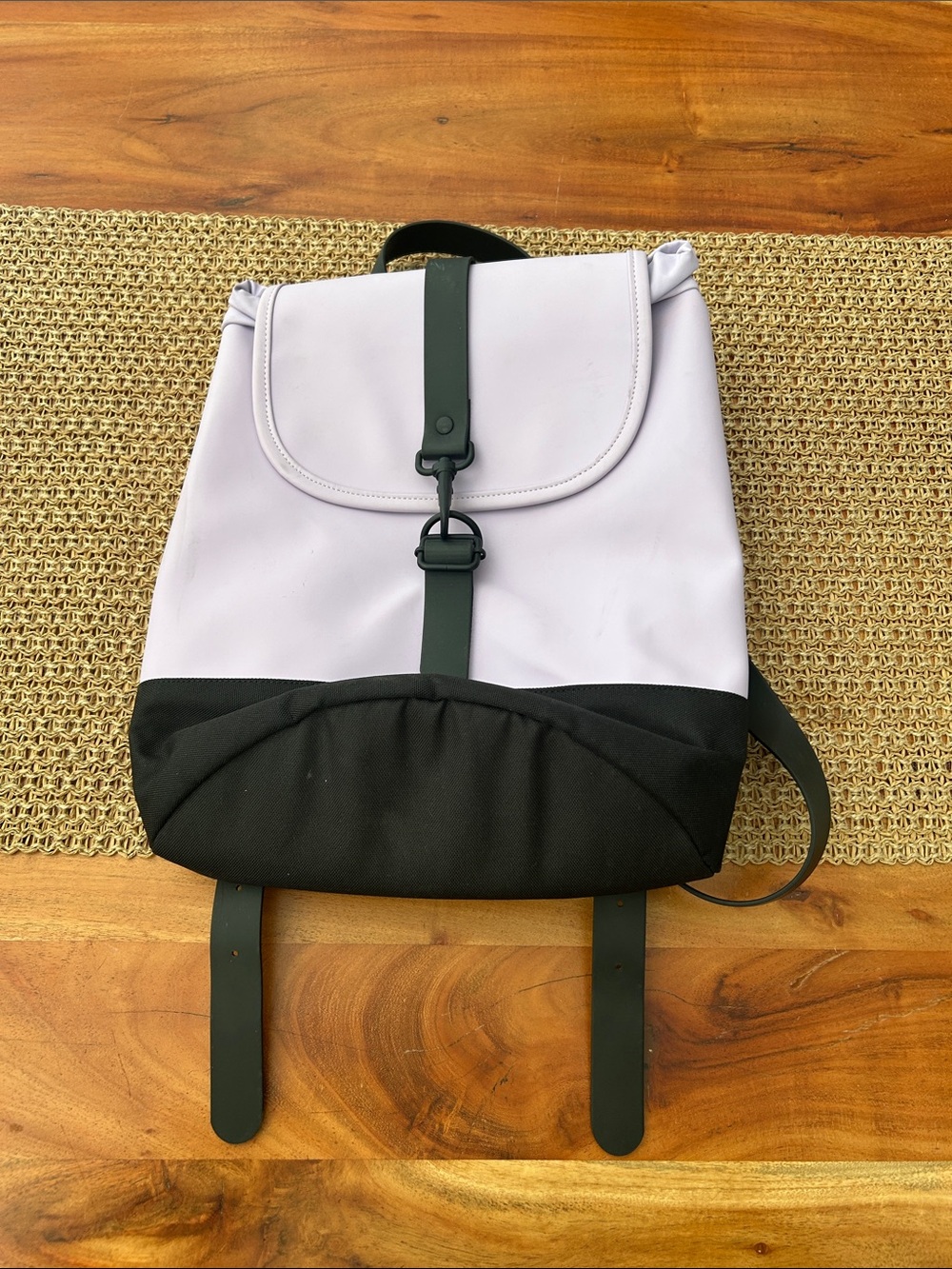 Rains Waterproof Backpack with canvas bottom in purple lilac
